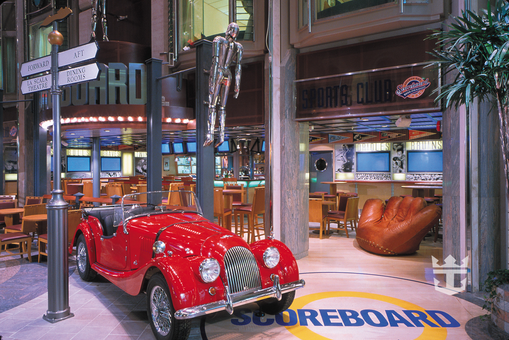 View of vintage car and dining area in Scoreboard Lounge